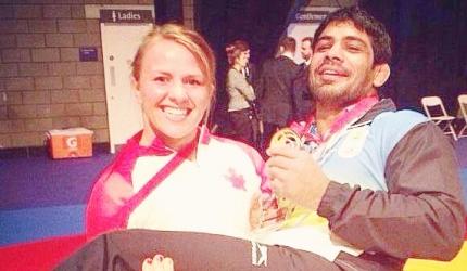 CWG PHOTOS: Female athlete lifts Sushil Kumar!