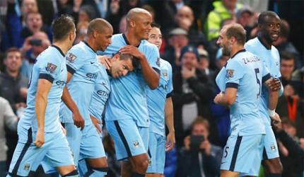 Manchester City bullish after cutting financial losses