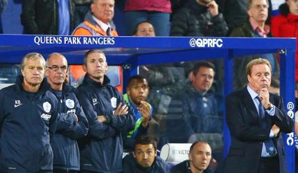 Wounded Redknapp leaves QPR but not quitting football