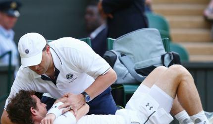 Wimbledon: Massaged Murray bites back to reach last 16