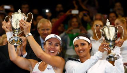 Sania seals historic Wimbledon crown with Hingis