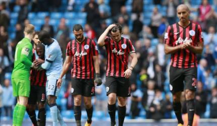 PHOTOS: QPR down after City mauling, Liverpool held