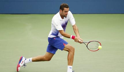 US Open: Defending champion Cilic fights back to live another day