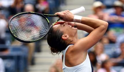 Pennetta stuns Halep to reach U.S. Open final