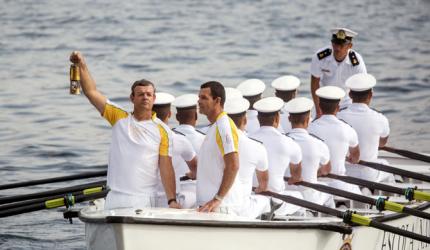 PHOTOS: Torch alights on Rio shore ahead of Olympic opening