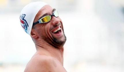 Mischievous Phelps leaves door ajar for sixth Games