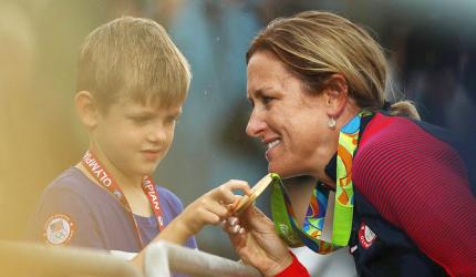 American Armstrong wins third straight time trial cycling gold