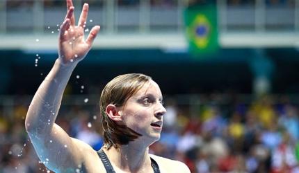 Ledecky smashes record in 800m to take freestyle treble