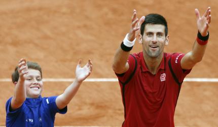 Djokovic, Serena face overtime in Paris