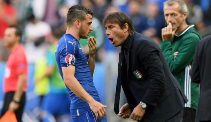 Flamboyant Conte roars out of garage and burns up grass