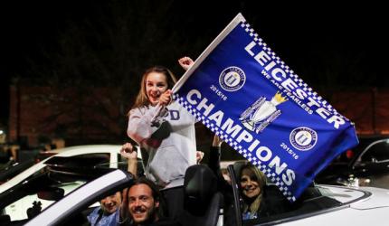 EPL PHOTOS: Euphoric Leicester fans throng streets in celebration