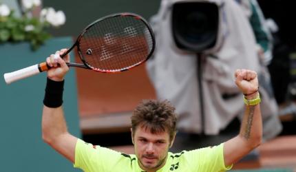 FRENCH OPEN PHOTOS: Wawrinka survives Rosol scare