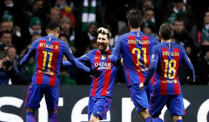 PHOTOS: Messi double lifts Barcelona, Man City advance