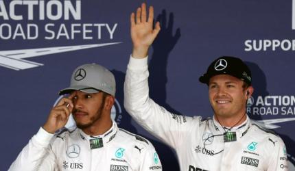 Rosberg fends off Hamilton to seize pole in Japan