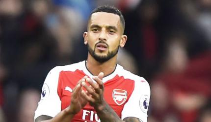 UEFA CL: Walcott warns against complacency despite superb form