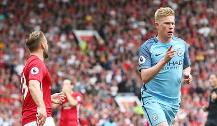 EPL title to be close fight between Manchester clubs