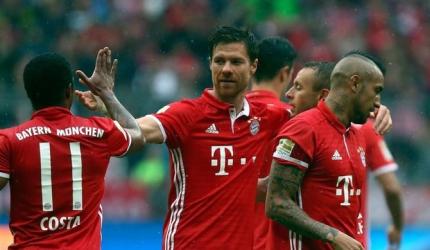 Bayern come back to beat Ingolstadt and stay top of table