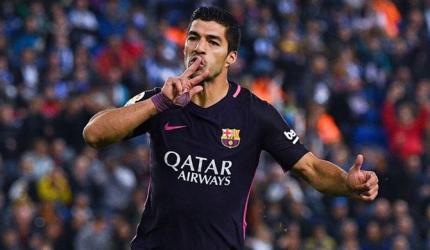 La Liga: Suarez double keeps Barca top, Marcelo rescues Real
