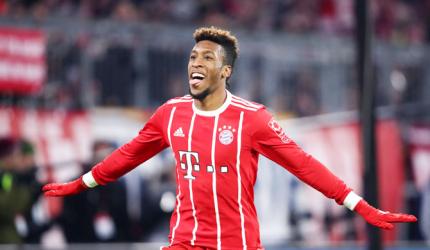 Football Briefs: Coman steers Bayern past Hanover, Dortmund held