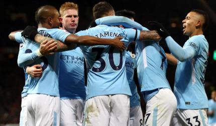 EPL PHOTOS: City down United in derby; Arsenal and Liverpool held