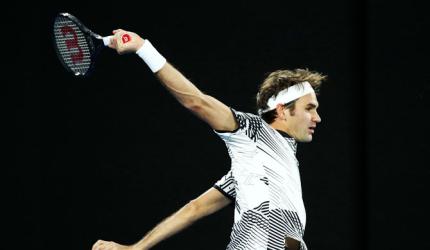 PHOTOS: Vintage Federer hammers Berdych to reach Aus Open last 16