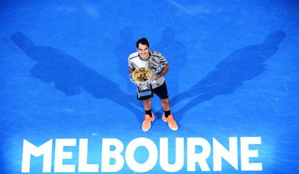 Emotional Federer savours long-awaited 18th slam win