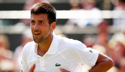 Djokovic means business as he reaches fourth round