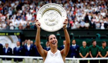 Wimbledon champion Muguruza eyes more trophies not rankings