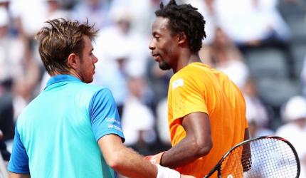 Wawrinka ends French men's challenge to reach last eight