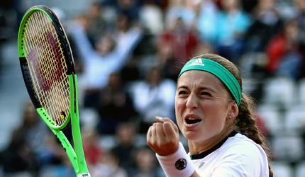 Ostapenko outclasses Wozniacki to reach French semis