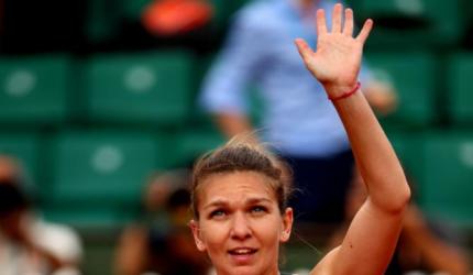 PHOTOS: Halep downs Pliskova to set up Ostapenko final