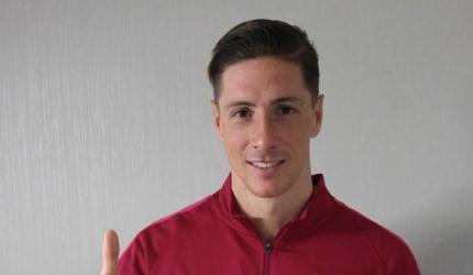 Atletico's Torres released from hospital after head injury