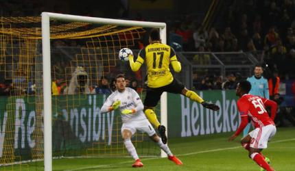 Aubameyang hat-trick leads Dortmund into last eight
