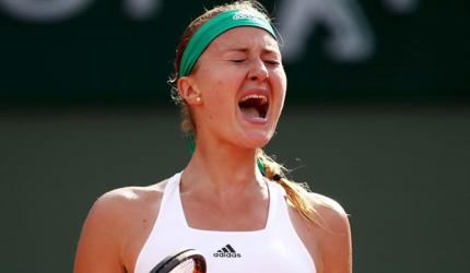 Mladenovic beats pain and Brady to advance