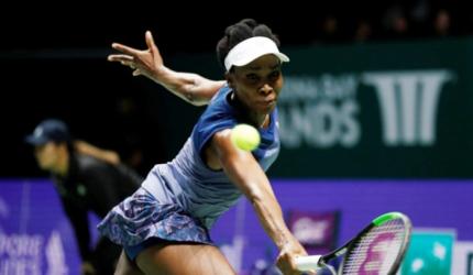 Evergreen Venus rallies past Garcia to set up Wozniacki final