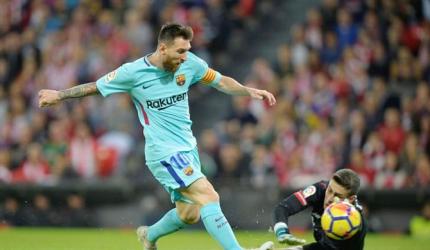 Messi scores again as Barca stay clear at the top