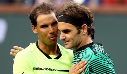 Federer and Nadal move within sight of landmark meeting