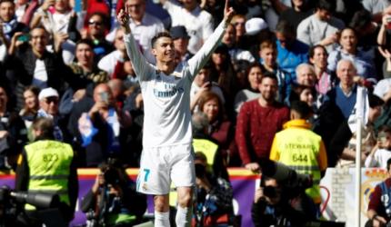 Football Briefs: Ronaldo on target in derby draw as Barca stretch Liga lead