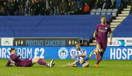 PICS: Ten-man Manchester City sunk by third-tier Wigan in FA Cup