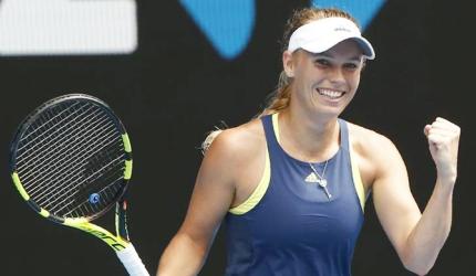 Aus Open PHOTOS: Wozniacki romps into quarters; Navarro rallies