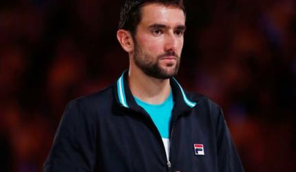 Cilic blames closed roof for slow start against Federer