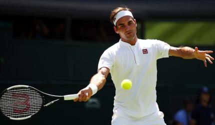 New-look Federer straight back in the old routine