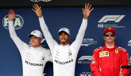F1: Hamilton beats the elements to seize pole in wet Hungary