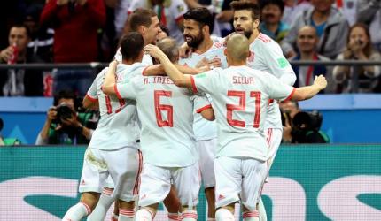 PHOTOS: Spain squeeze past dogged Iran to stay alive