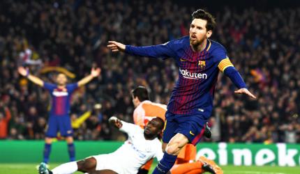 King Messi lights up Nou Camp with 100th Champions League goal