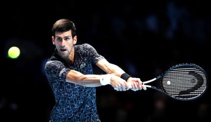 ATP Tour Finals: Djokovic tames Isner as Ronaldo watches