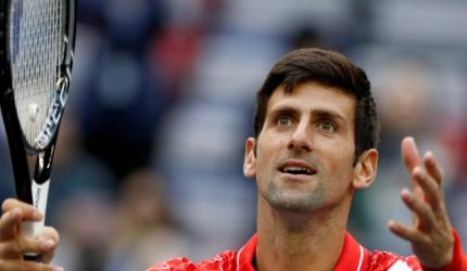 Federer, Djokovic advance to Shanghai semis