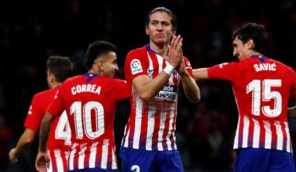 Football Roundup: Atletico go top of La Liga