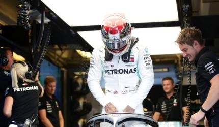 Hamilton fastest overall on damp day in Hungary