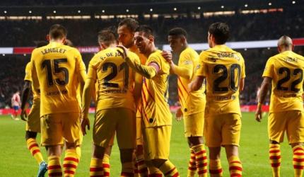Magical Messi sinks Atletico as Barca return to the top
